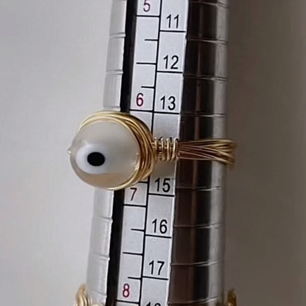 White evil eye ring